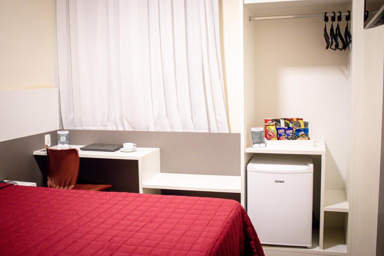 Hotel H2 Congonhas Congonhas  Ngoại thất bức ảnh A typical room at a capsule hotel